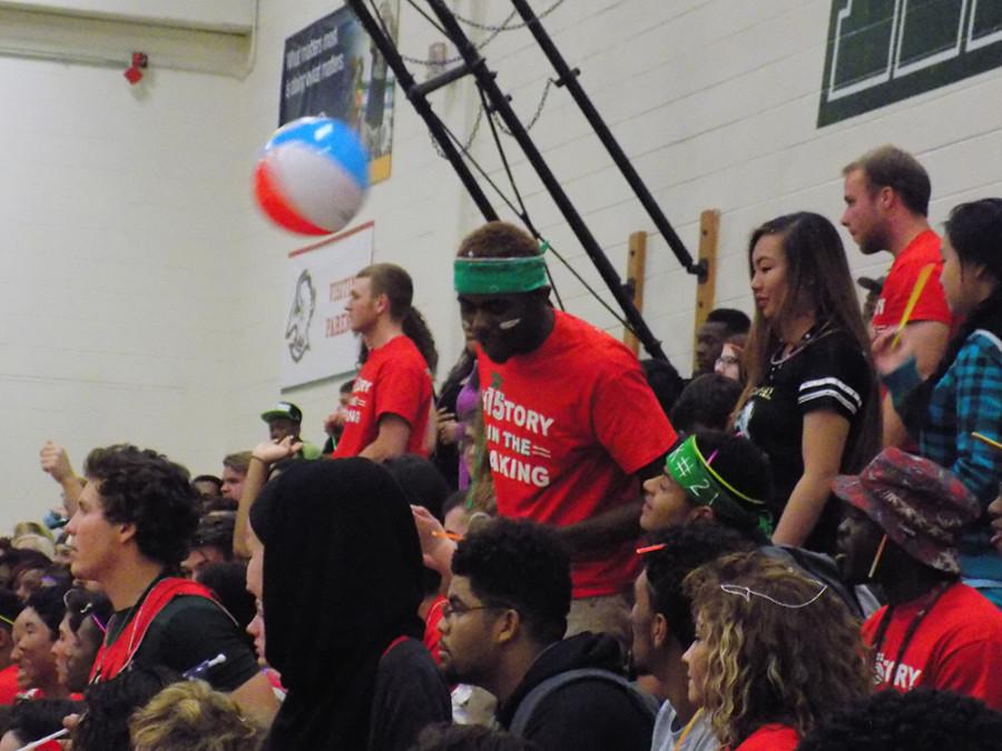 Seniors toss around beach balls and spray silly string.