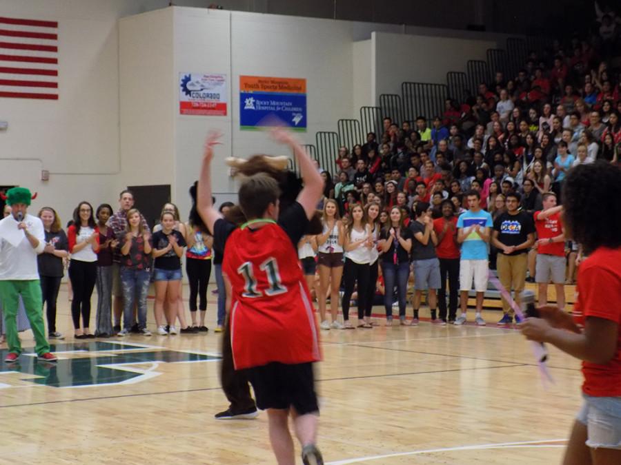 Unified Basketball champion, Blake Yaw, races to the middle of the gym.