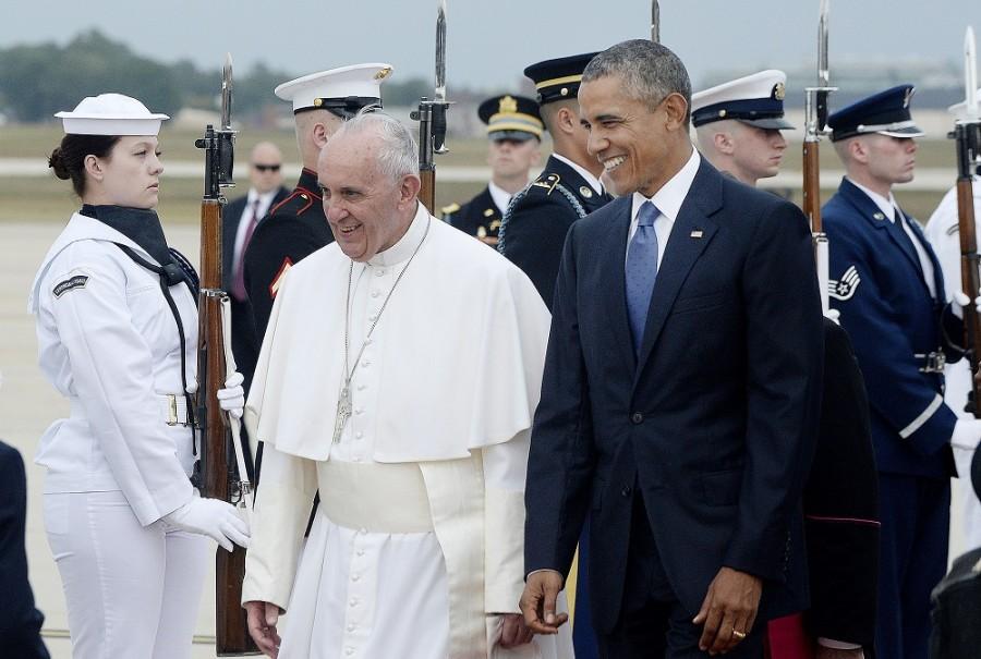 U.S. President Barack Obama greets His Holiness Pope Francis on his arrival at Joint Base Andrews in Maryland on Tuesday, Sept. 22, 2015. The Pope is making his first trip to the United States on a three-city, five-day tour that will include Washington, D.C., New York and Philadelphia. (Olivier Douliery/Abaca Press/TNS)