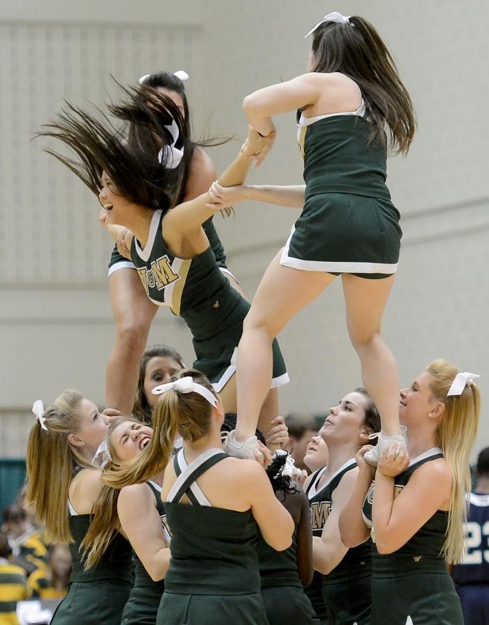 William & Mary cheerleaders perform during the second half between William & Mary and North Carolina-Wilmington at Kaplan Arena in Williamsburg, Virginia, Wednesday, February 13, 2013. William & Mary defeated UNCW, 92-86. (Chuck Myers/MCT)