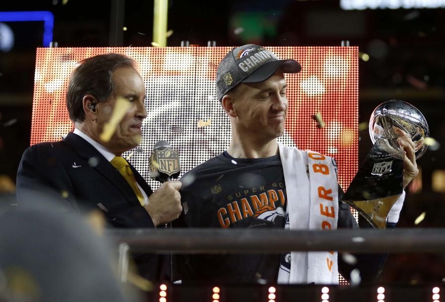 Denver Broncos starting quarterback Peyton Manning, right, holds the Lombardi Trophy after the Broncos' 24-10 win against the Carolina Panthers in Super Bowl 50 at Levi's Stadium in Santa Clara, Calif., on Sunday, Feb. 7, 2016. The Broncos won, 24-10. (Nhat V. Meyer/Bay Area News Group/TNS)