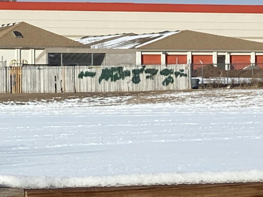Covered up graffiti on Smoky Hills lacrosse field
