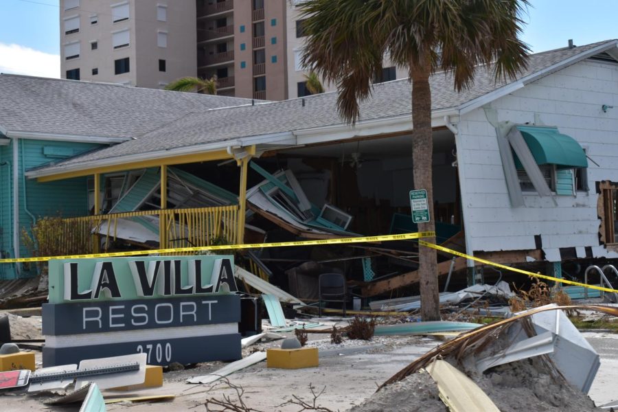 A little beach resort, La Villa Resort, is heavily damaged by hurricane Ian with the front wall on the porch and destruction to the buildings structure.
