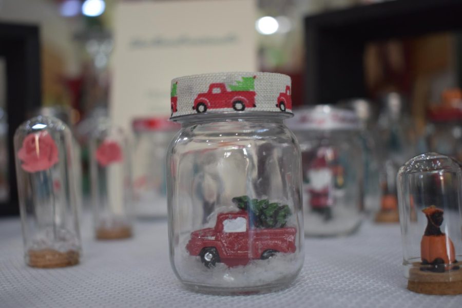 A line of small snow globes to be sold at the Craft Fair.