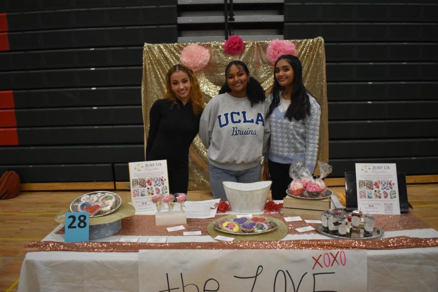 Zainb Khan and other students selling sweets from Just Us Cupcakes to help out Wish Kid Amir.
