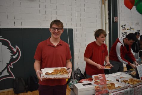 Dylan Beaudet and his partners sold cinnamon rolls to fundraise for Make a Wish after they were sponsored by DuffyRolls.